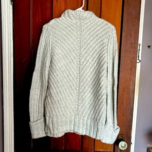 Jennifer Lopez high neck sweater